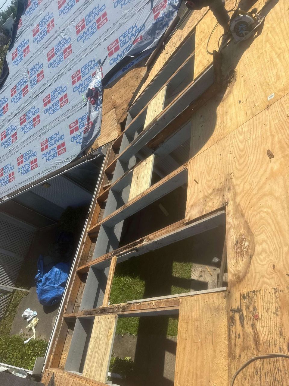 Roof repair work by A&W Roofing, May 2026