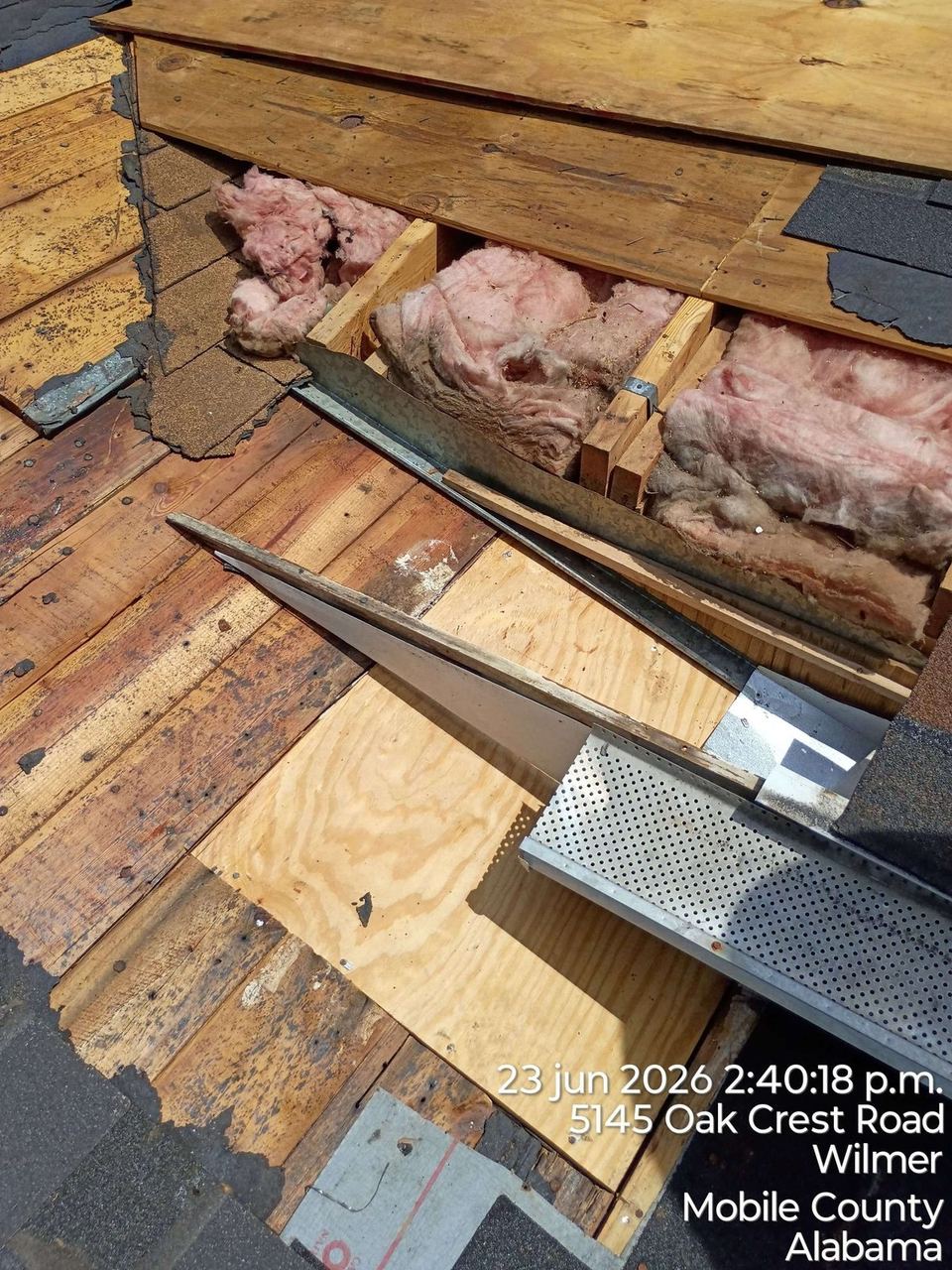 Roof repair work by A&W Roofing, June 2026