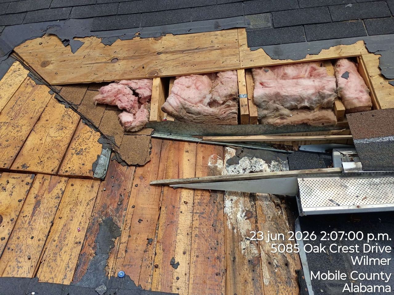 Roof repair work by A&W Roofing, June 2026