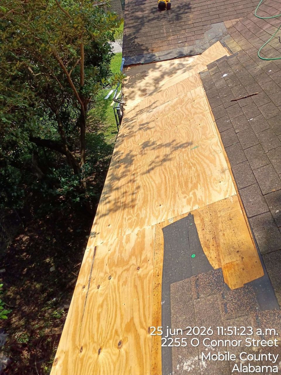 Roof repair work by A&W Roofing, June 2026